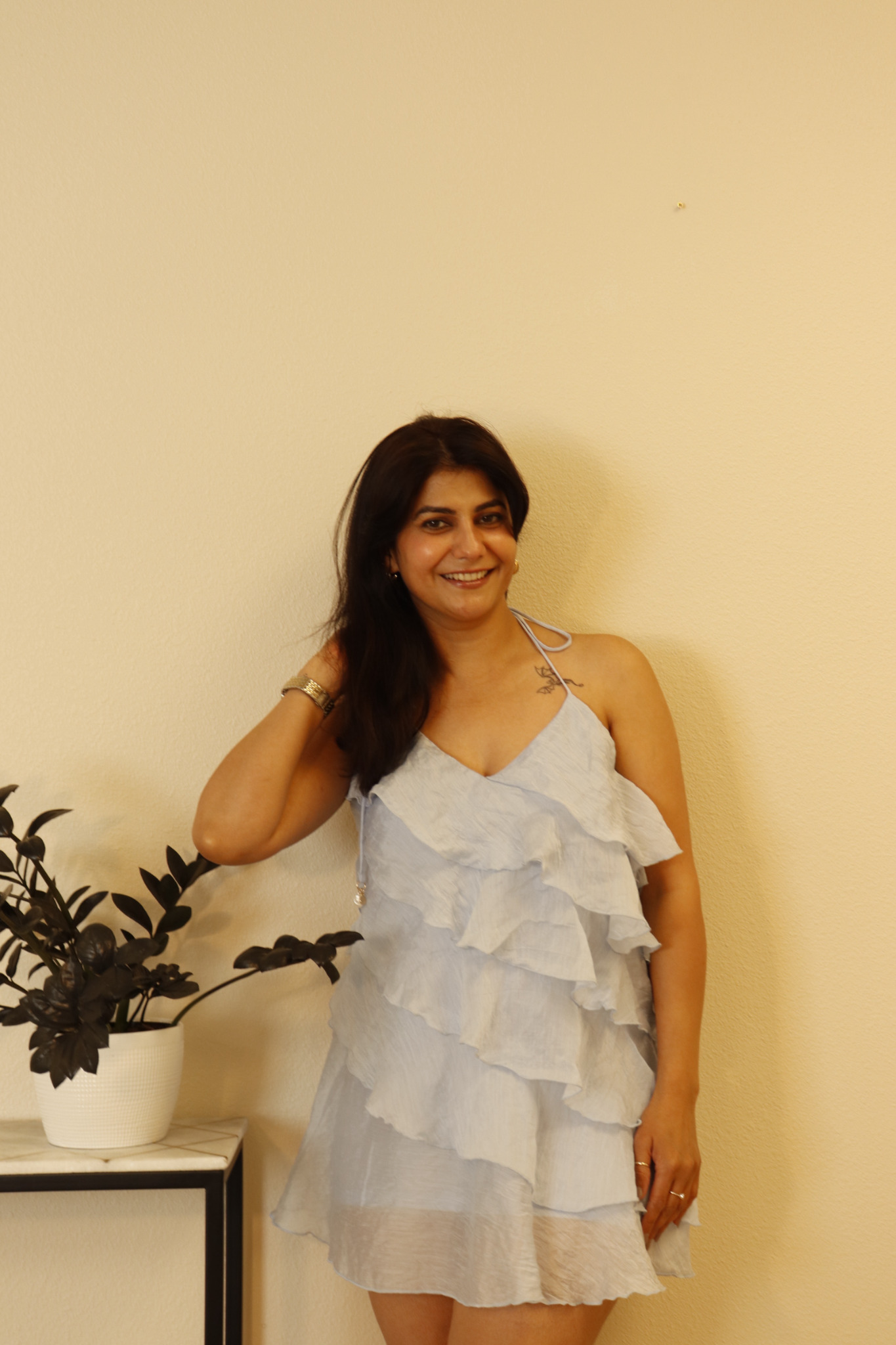 Moon Sheoran posing in a light blue ruffled dress